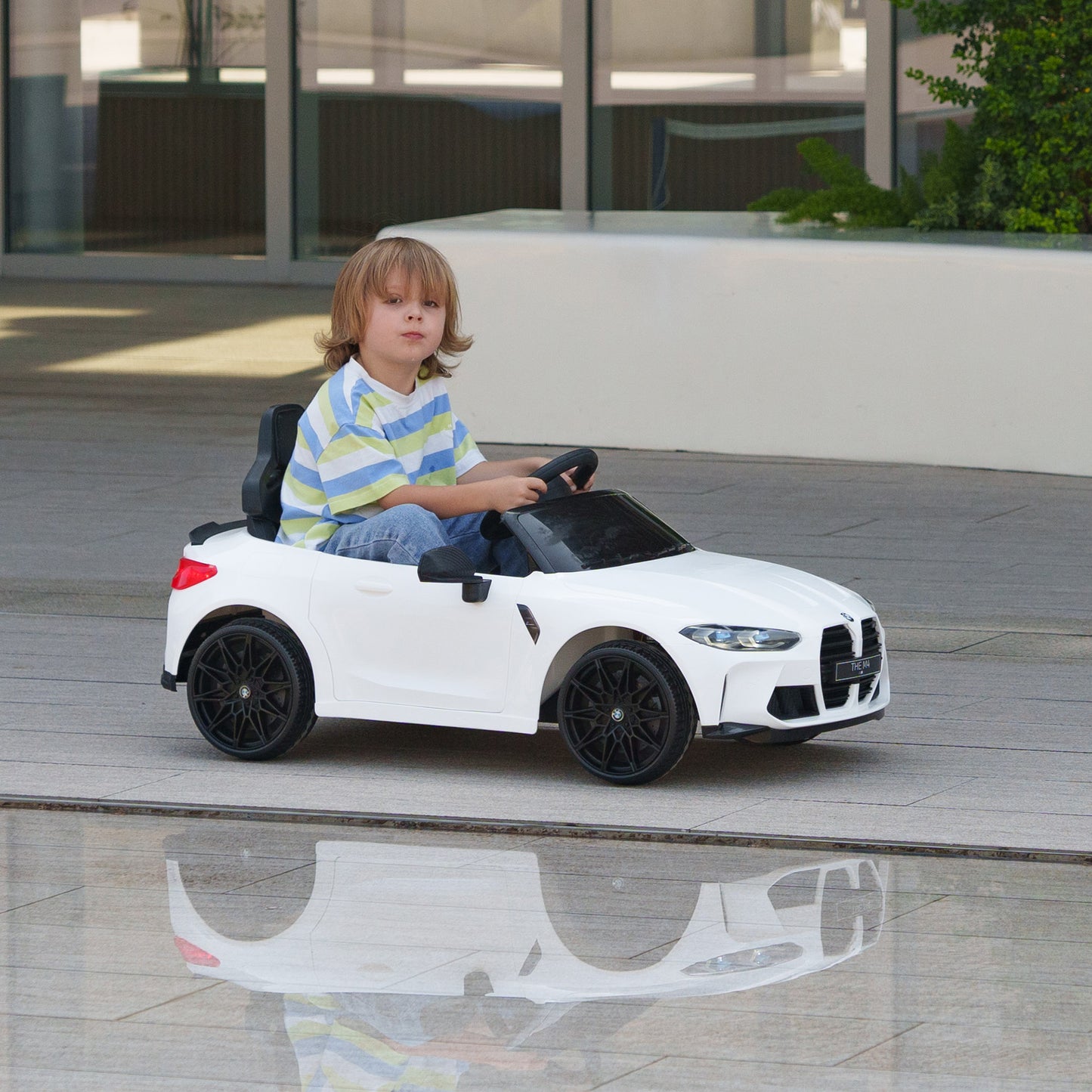 12V BMW M4 Licensed Kids Car with Easy Transport, Remote Control, Suspension, Music, Horn, LED Lights in White by AIYAPLAY